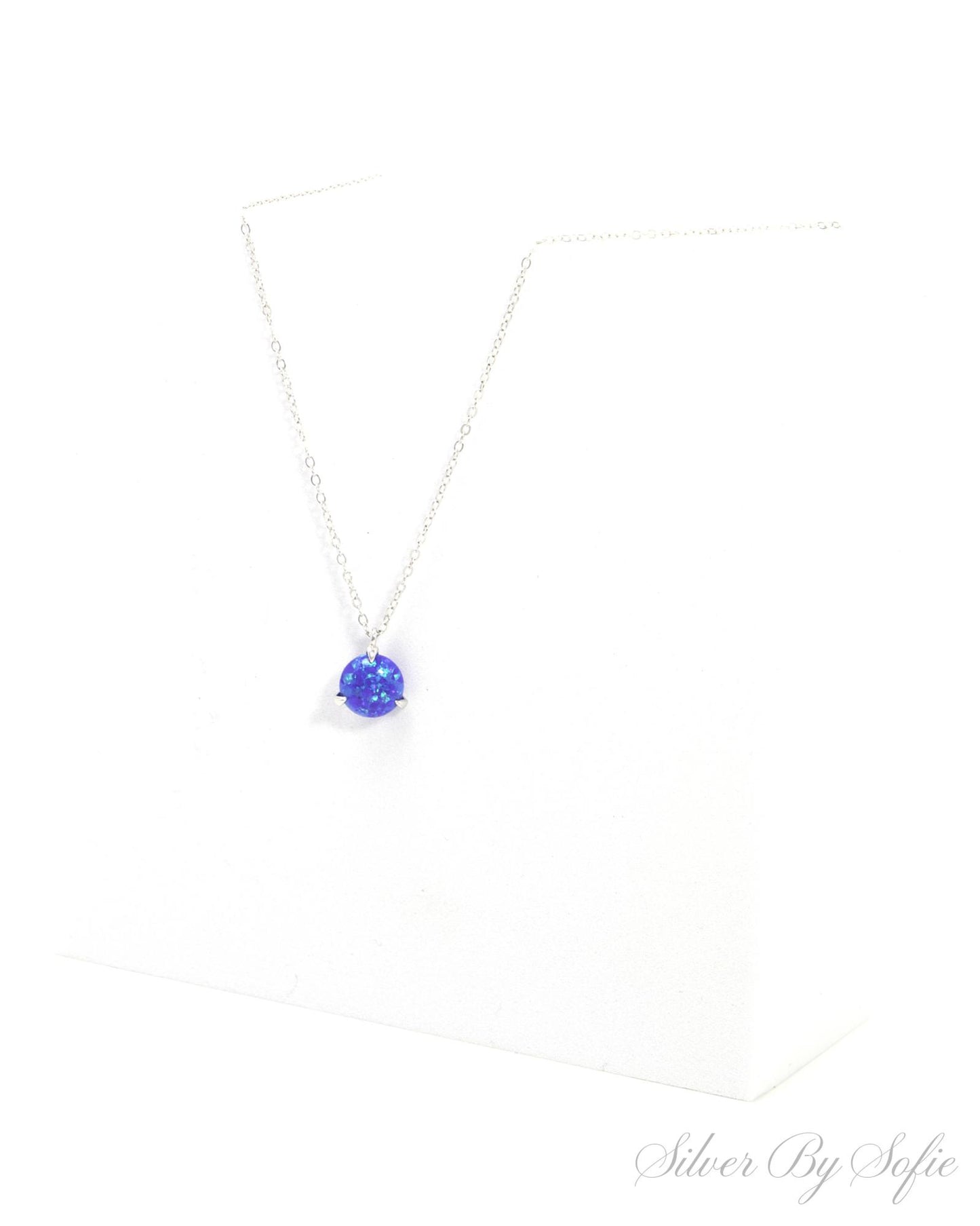 Dark blue opal sterling silver 3 prong necklace