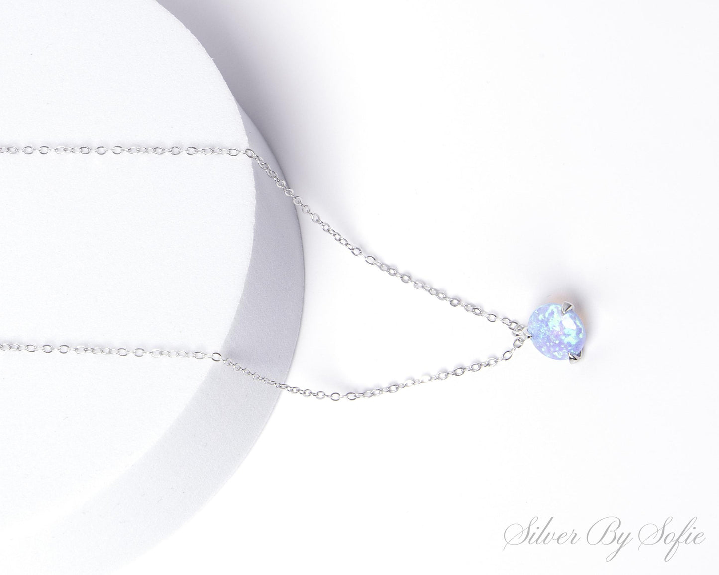 Light blue opal sterling silver 3 prong necklace